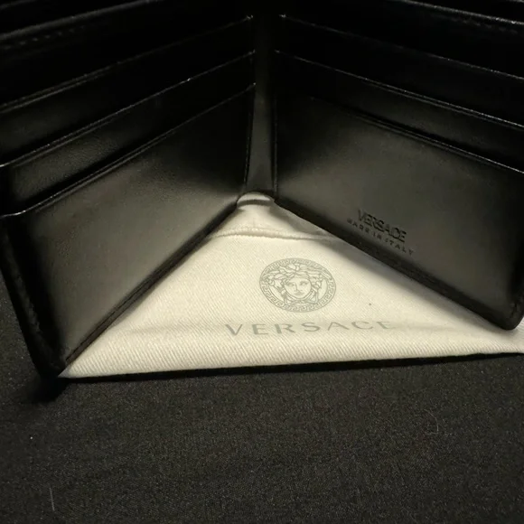 Versace blue multicolor leather La Greca bifold wallet.